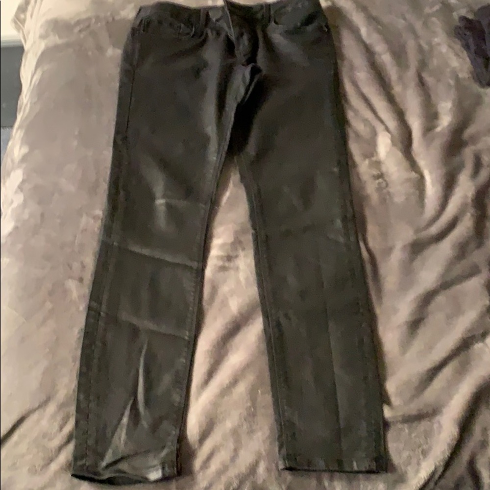 Shiny black skinny jeans